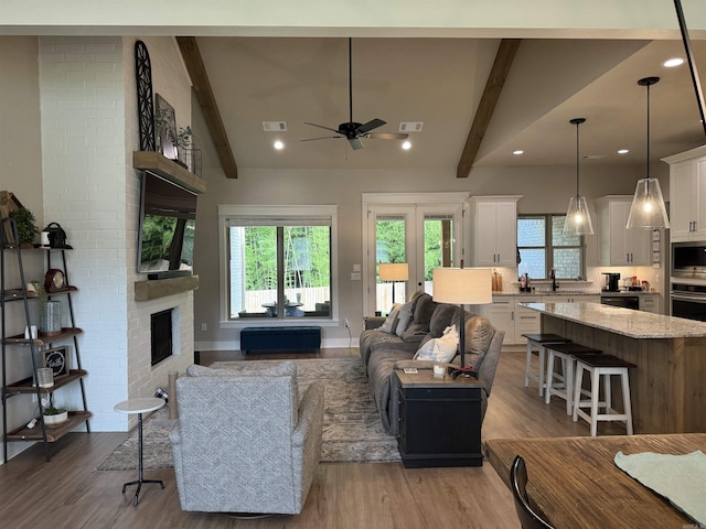 106 Harmony Village Dr, Haskell, AR 72015 - living area with light wood finished floors, healthy amount of natural light, ceiling fan, and recessed lighting