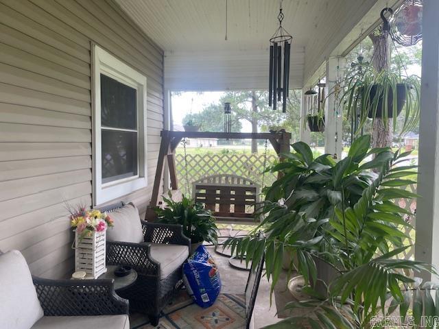 sunroom featuring healthy amount of natural light