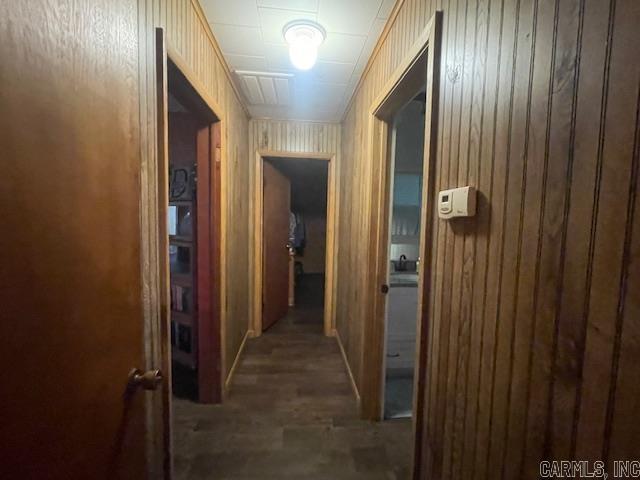 hall with wood walls