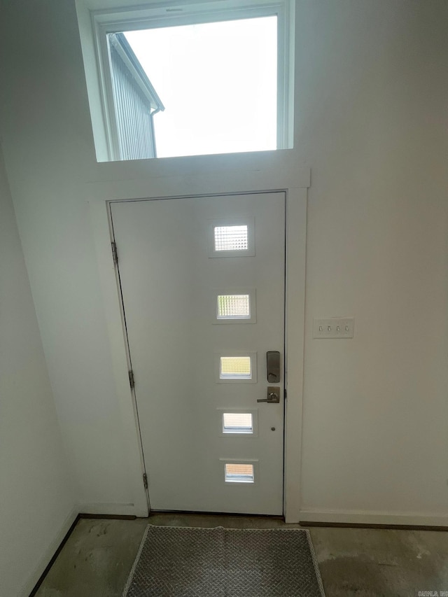doorway featuring concrete flooring