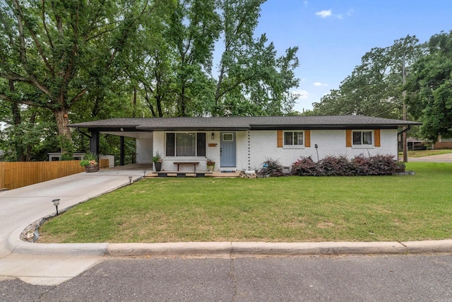 201 Sunset St, Hot Springs, AR 71913 - view of front of property featuring driveway, brick siding, a carport, and covered porch