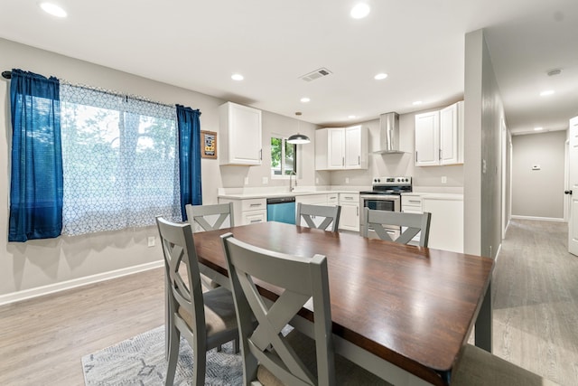 201 Sunset St, Hot Springs, AR 71913 - dining room featuring baseboards, light wood-style floors, and recessed lighting