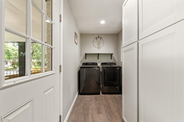 201 Sunset St, Hot Springs, AR 71913 - laundry area featuring washer and dryer, baseboards, light wood-style floors, and recessed lighting