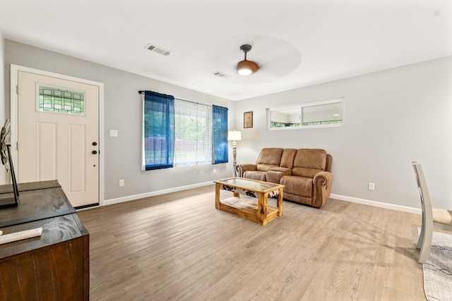 201 Sunset St, Hot Springs, AR 71913 - living room with light wood-style flooring, baseboards, and a ceiling fan