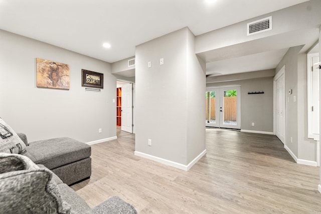 201 Sunset St, Hot Springs, AR 71913 - living area with baseboards, light wood finished floors, recessed lighting, and french doors