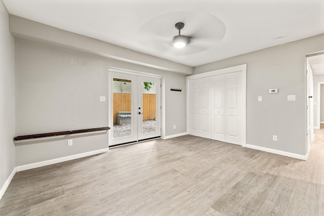201 Sunset St, Hot Springs, AR 71913 - unfurnished bedroom featuring access to exterior, french doors, wood finished floors, and baseboards
