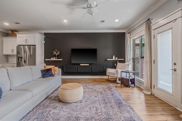 118 Lydia Dr, Maumelle, AR 72113 - living area with ornamental molding, ceiling fan, light wood-style floors, and recessed lighting