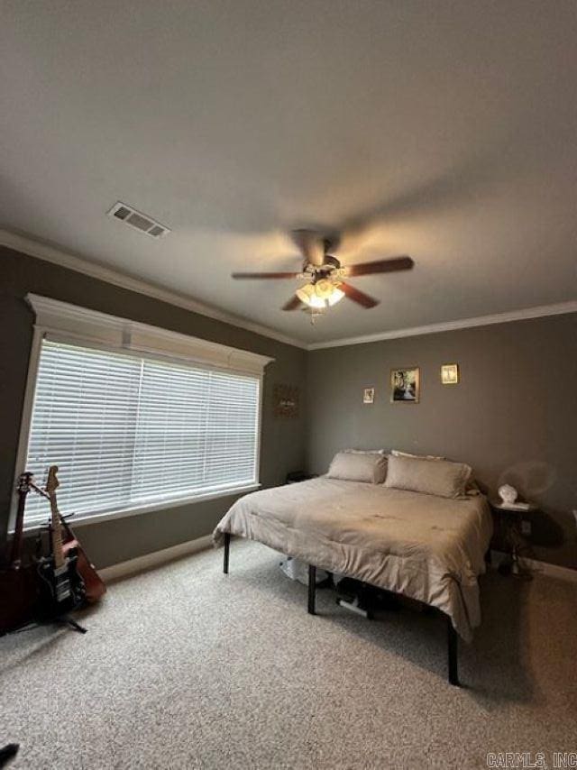 13815 Carrington Place Dr, Alexander, AR 72002 - bedroom with carpet, multiple windows, ornamental molding, a ceiling fan, and baseboards