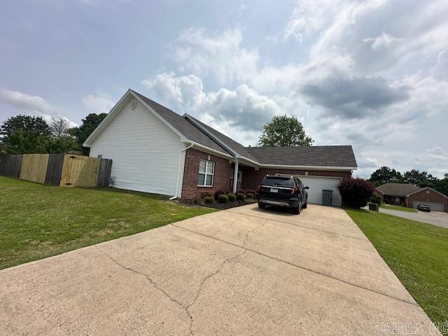 13815 Carrington Place Dr, Alexander, AR 72002 - ranch-style home with a garage, brick siding, and concrete driveway