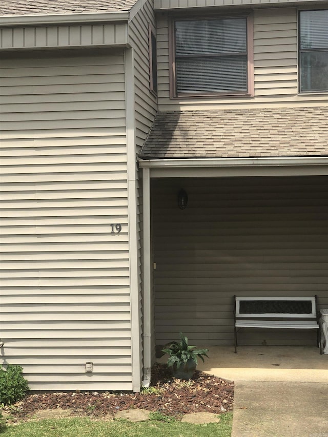 135 Hillview Dr Unit 19, Fairfield Bay, AR 72088 - doorway to property with roof with shingles