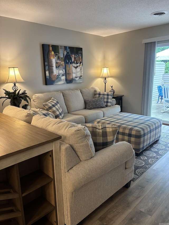 135 Hillview Dr Unit 19, Fairfield Bay, AR 72088 - living room featuring wood finished floors and a textured ceiling