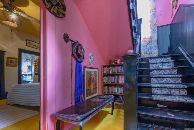 1107 Magnolia, Mena, AR 71953 - stairs featuring vaulted ceiling