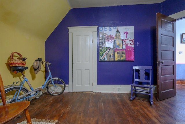 1107 Magnolia, Mena, AR 71953 - interior space featuring hardwood / wood-style floors and vaulted ceiling
