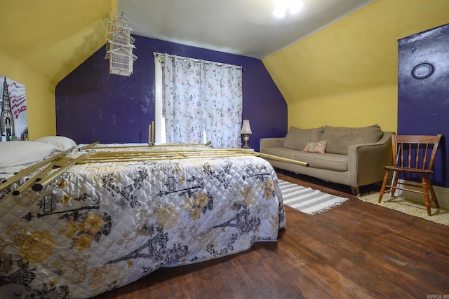 1107 Magnolia, Mena, AR 71953 - bedroom with lofted ceiling and wood finished floors