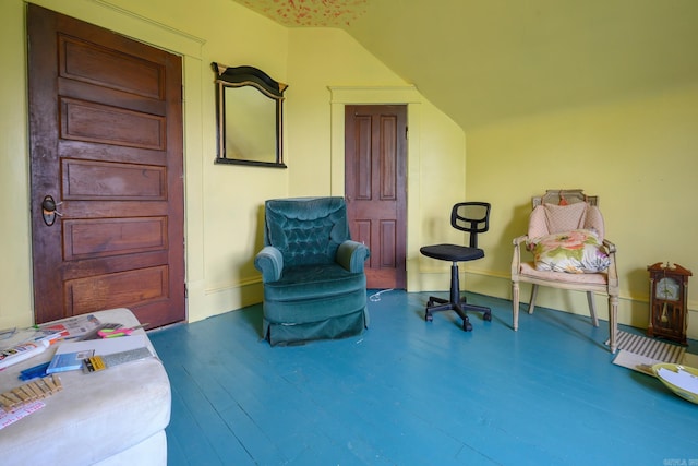 1107 Magnolia, Mena, AR 71953 - sitting room with wood finished floors, lofted ceiling, and baseboards