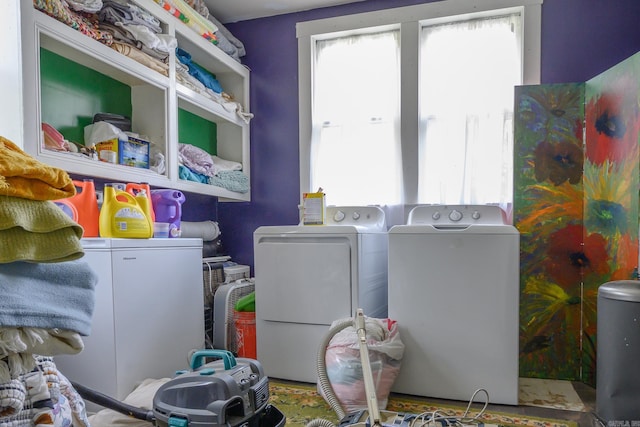 1107 Magnolia, Mena, AR 71953 - laundry room with independent washer and dryer and healthy amount of natural light