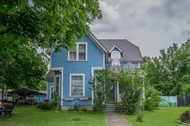 1107 Magnolia, Mena, AR 71953 - victorian home with a detached carport