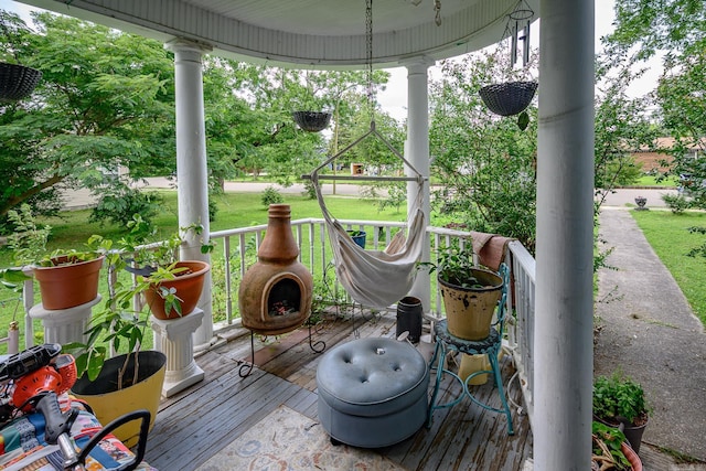 1107 Magnolia, Mena, AR 71953 - porch featuring a yard