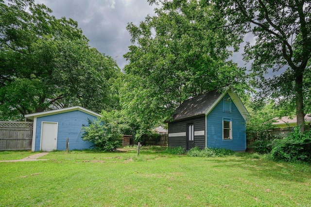 1107 Magnolia, Mena, AR 71953 - view of yard featuring an outbuilding