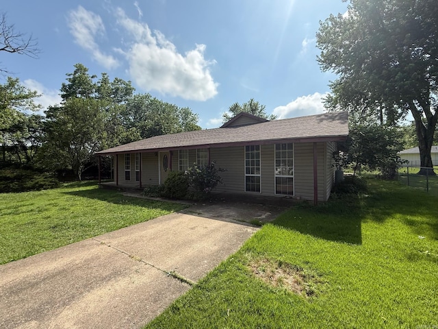 211 Turner St, Mena, AR 71953 - single story home with concrete driveway and roof with shingles