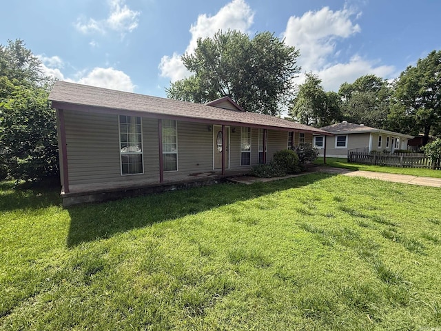 211 Turner St, Mena, AR 71953 - ranch-style home featuring a porch and a front yard