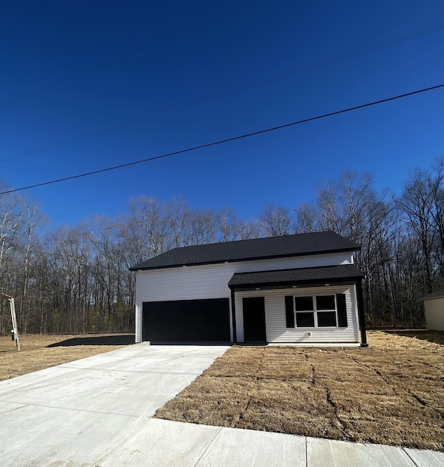 233 Iris, Benton, AR 72015 - garage featuring driveway