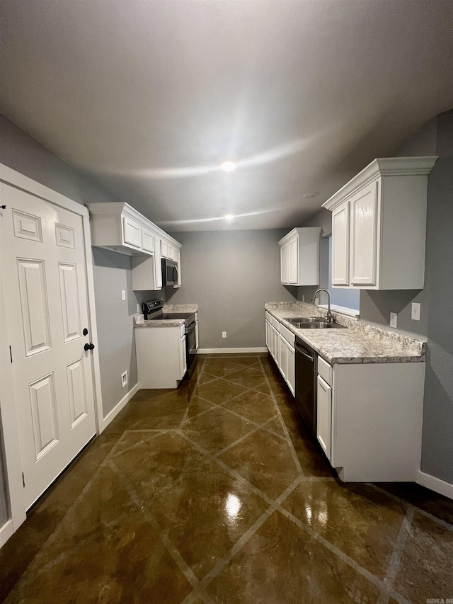 233 Iris, Benton, AR 72015 - kitchen with electric range oven, dishwasher, a sink, baseboards, and stainless steel microwave