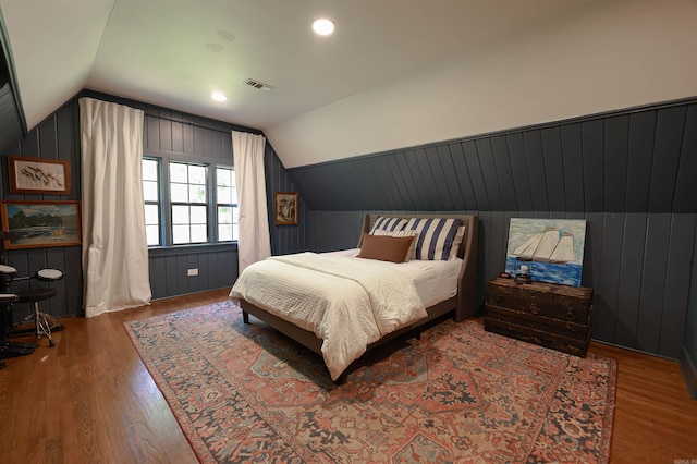 837 Maple St, Camden, AR 71701 - bedroom featuring lofted ceiling, wood finished floors, and wood walls