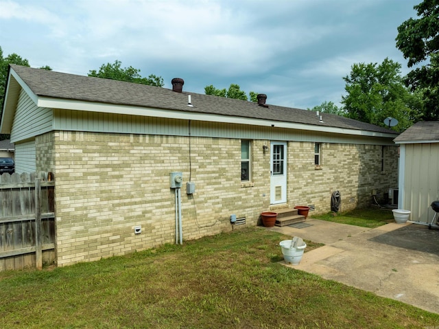 1417 Meadowbrook Dr, Heber Springs, AR 72543 - back of property featuring entry steps, brick siding, and a patio