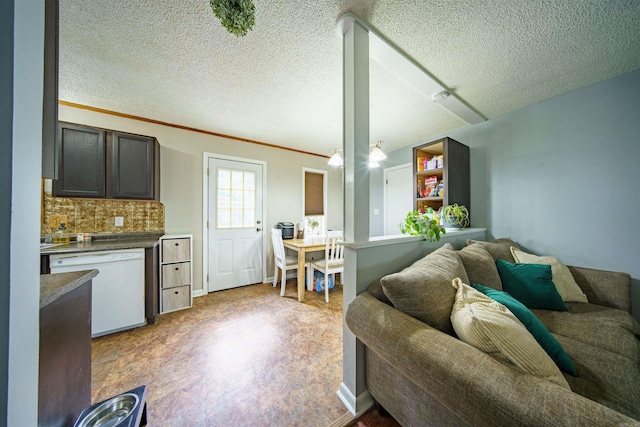 1417 Meadowbrook Dr, Heber Springs, AR 72543 - living area featuring light wood-type flooring, a textured ceiling, and crown molding