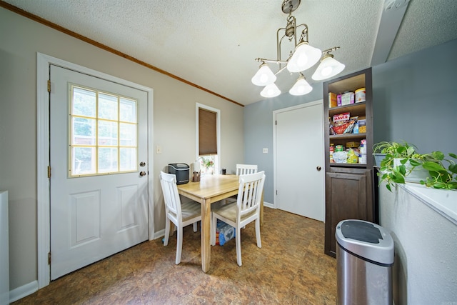 1417 Meadowbrook Dr, Heber Springs, AR 72543 - dining room with a chandelier, ornamental molding, and a textured ceiling