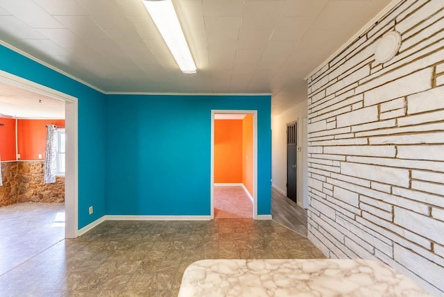 spare room with crown molding