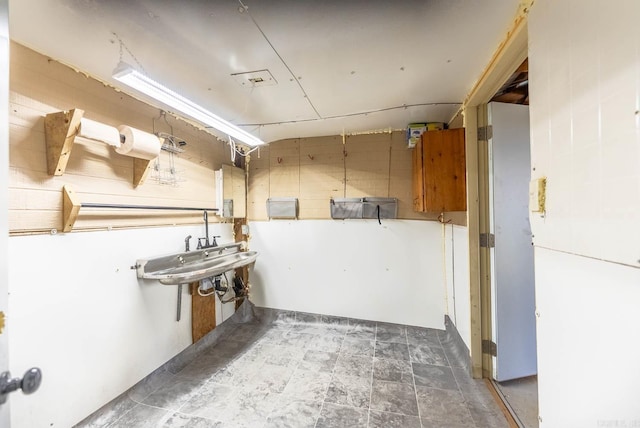 basement featuring a sink