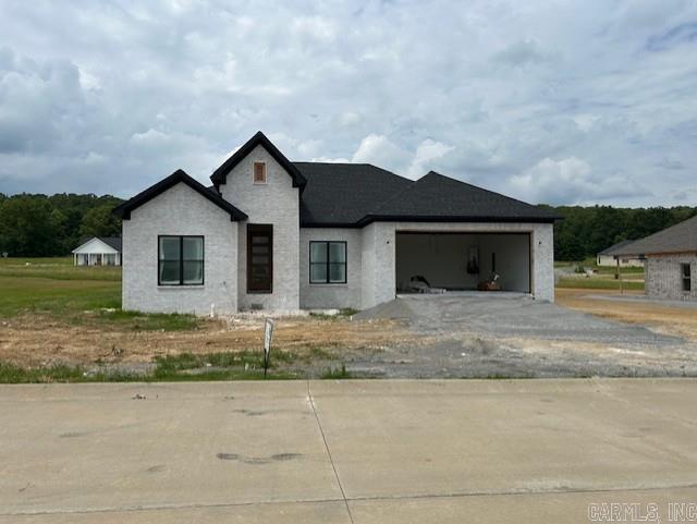 5 Ridge View Cv, Vilonia, AR 72173 - view of front of home with driveway and a garage