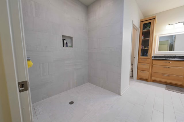 343 Boulder Rd, Royal, AR 71968 - full bathroom with vanity, tiled shower, and tile patterned floors