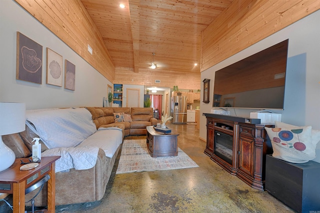343 Boulder Rd, Royal, AR 71968 - living room featuring wood walls, concrete flooring, wooden ceiling, and a high ceiling