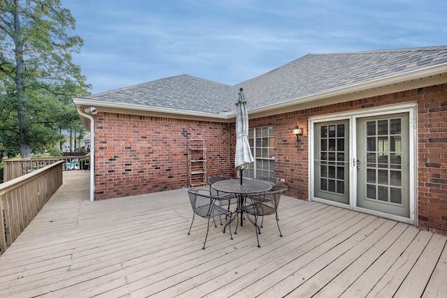 16 Masters Place Dr, Maumelle, AR 72113 - wooden deck with outdoor dining space