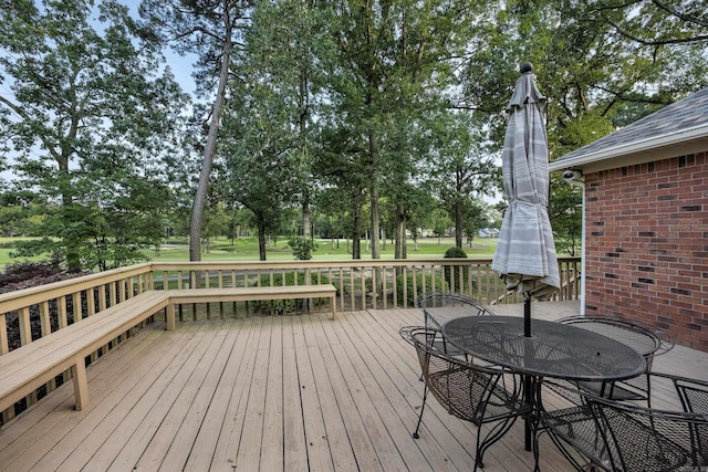 16 Masters Place Dr, Maumelle, AR 72113 - deck featuring view of scattered trees and outdoor dining area