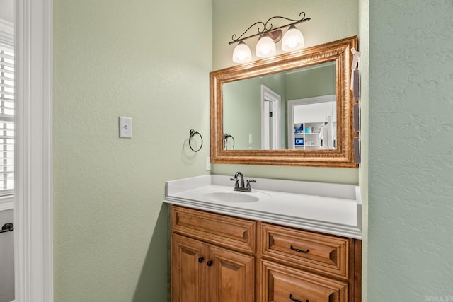 3 E Castlepines, Greenbrier, AR 72058 - bathroom with vanity and a textured wall