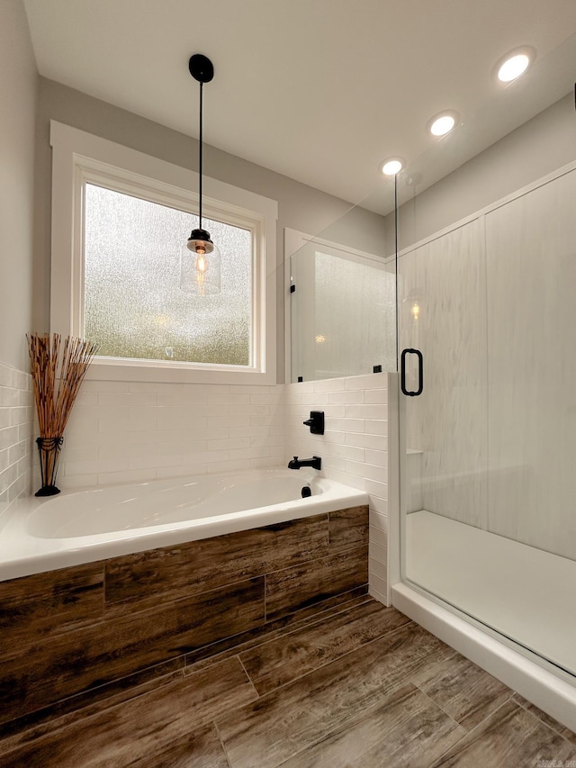 38 Oak Ridge Dr, Gepp, AR 72538 - full bath with a bath, a shower stall, and wood finished floors