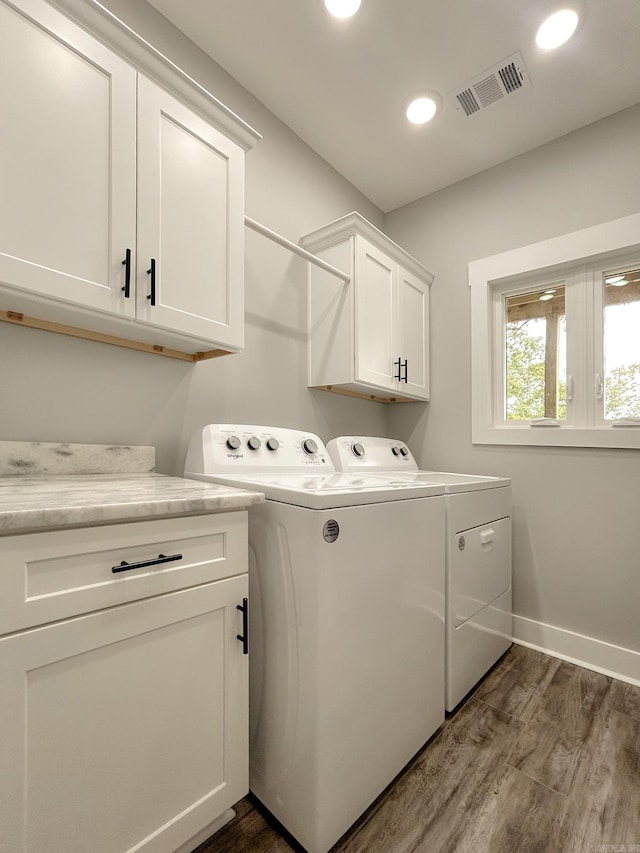 38 Oak Ridge Dr, Gepp, AR 72538 - laundry area featuring cabinet space, washing machine and dryer, dark wood-type flooring, baseboards, and recessed lighting