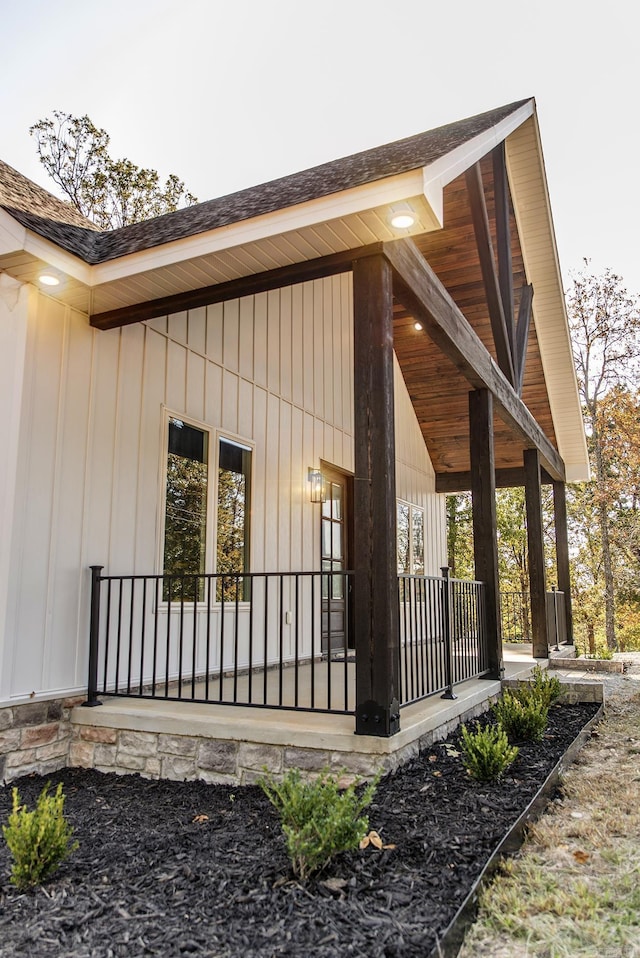38 Oak Ridge Dr, Gepp, AR 72538 - view of side of home with a porch and a shingled roof