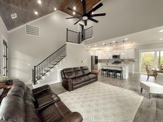 38 Oak Ridge Dr, Gepp, AR 72538 - living area featuring wooden ceiling, recessed lighting, stairs, a ceiling fan, and high vaulted ceiling