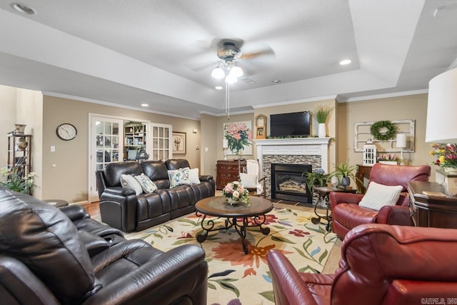 111 Country Oaks Dr, Malvern, AR 72104 - living area with a raised ceiling, a ceiling fan, a fireplace, ornamental molding, and recessed lighting