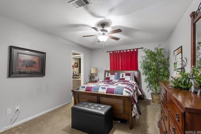 111 Country Oaks Dr, Malvern, AR 72104 - bedroom with carpet, baseboards, ensuite bath, a textured ceiling, and a ceiling fan
