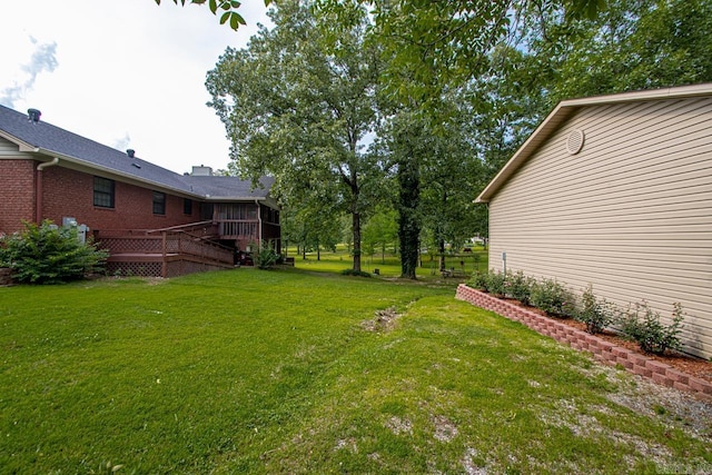111 Country Oaks Dr, Malvern, AR 72104 - view of green lawn featuring a wooden deck and a sunroom