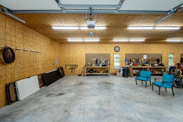 111 Country Oaks Dr, Malvern, AR 72104 - garage featuring a workshop area and a garage door opener
