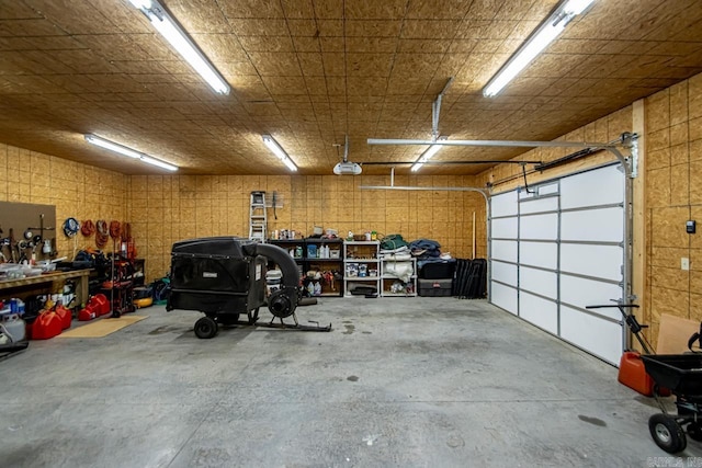 111 Country Oaks Dr, Malvern, AR 72104 - garage with a garage door opener and a workshop area