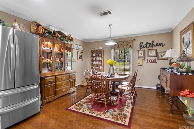 111 Country Oaks Dr, Malvern, AR 72104 - dining space with dark wood-type flooring, baseboards, and ornamental molding