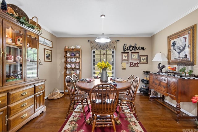 111 Country Oaks Dr, Malvern, AR 72104 - dining space with dark wood-style flooring, crown molding, and baseboards